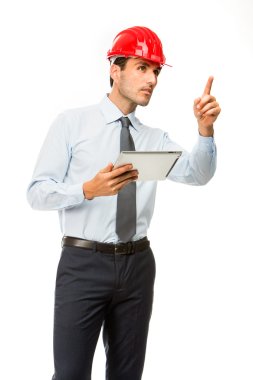 Half length portrait of a construction supervisor with digital tablet showing a project clipart