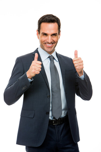 Half length portrait of a businessman smiling and giving ok sign with both hands