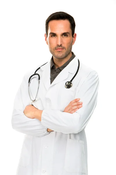 Retrato de medio cuerpo de un médico varón reflexivo con brazos cruzados y estetoscopio —  Fotos de Stock