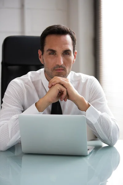 Half length portrait of a thoughtful male businessman — Stock Photo, Image