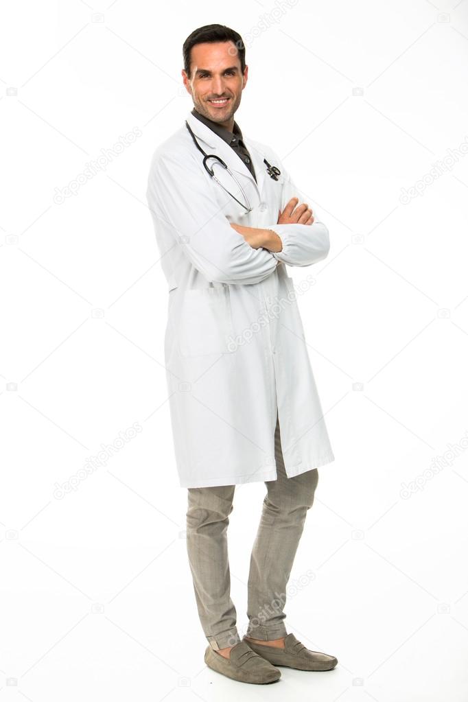 Full length portraif of a male doctor, smiling at camera with crossed arms and stethoscope