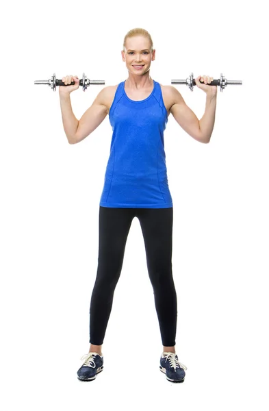 Blonde woman wearing fitness clothing exercising with weights — Stock Photo, Image