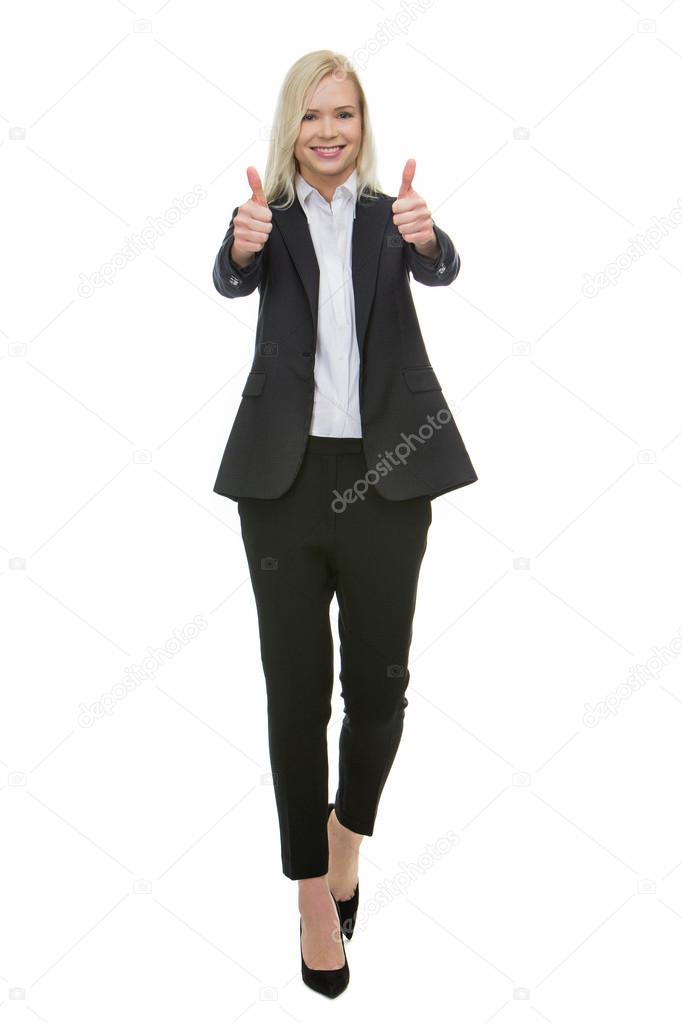 Smiling blonde businesswoman thumbs up with both hands