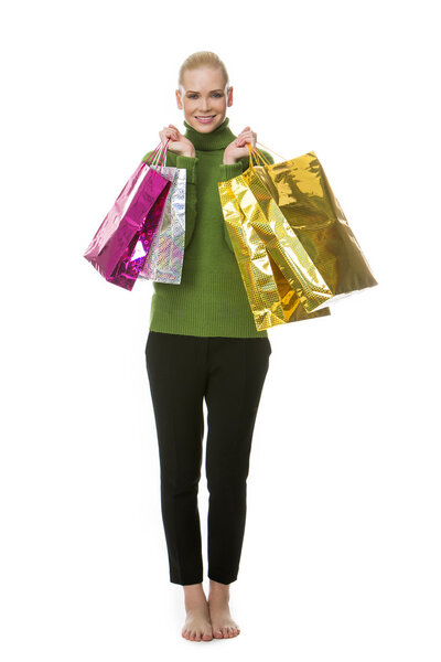 woman carrying gift bags