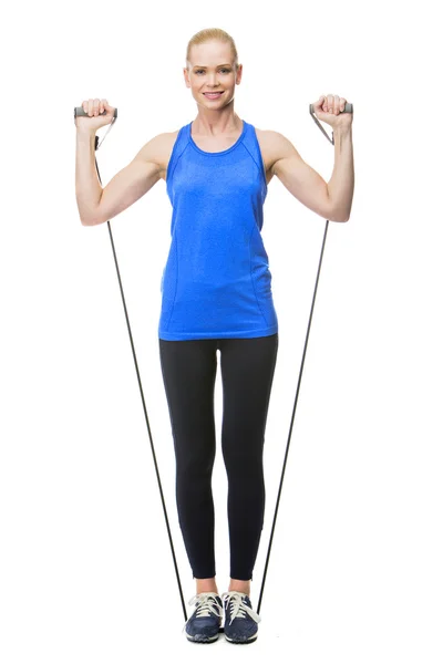 Woman exercising with rubber band — Stock Photo, Image