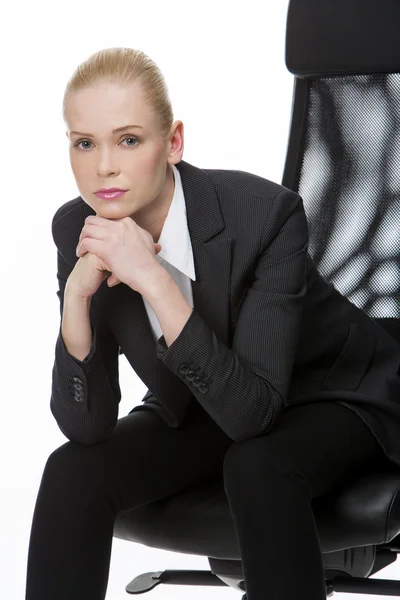 Businesswoman seated on a chair — Stock Photo, Image