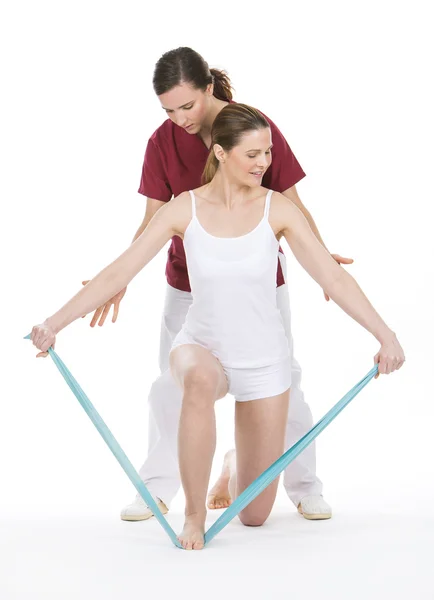 Woman with physiotherapist — Stock Photo, Image