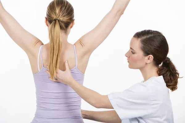 Woman with physiotherapist — Stock Image Woman with physiotherapist Stock Image