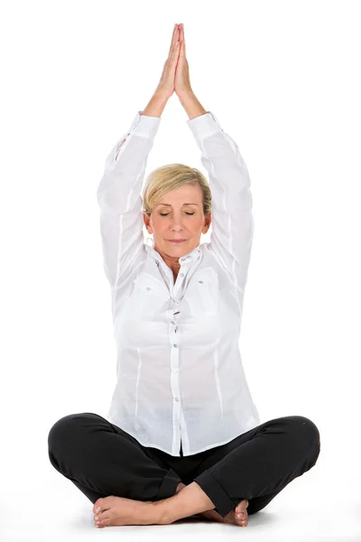 Gerente mujer haciendo yoga en blanco fondo — Foto de Stock