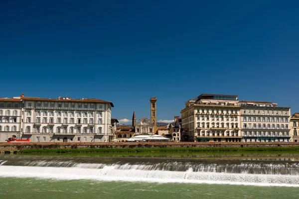 Sunny view of Chiesa di Ognissanti (All-Saints Church) and river — Stock Photo, Image