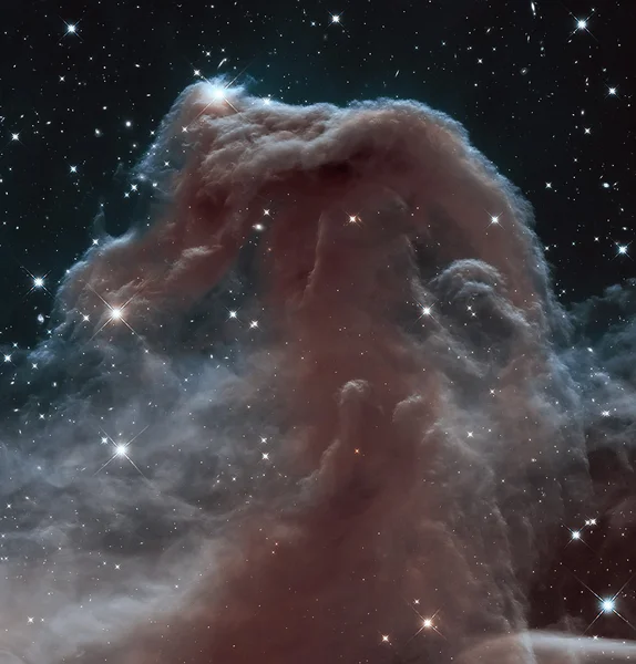 A Nebulosa Cabeça de Cavalo é uma densa nuvem de gás e poeira — Fotografia de Stock