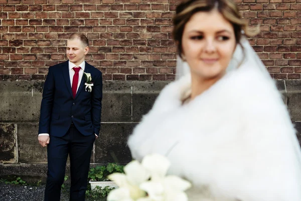 Happy blonde bride and handsome groom — Stock Photo, Image