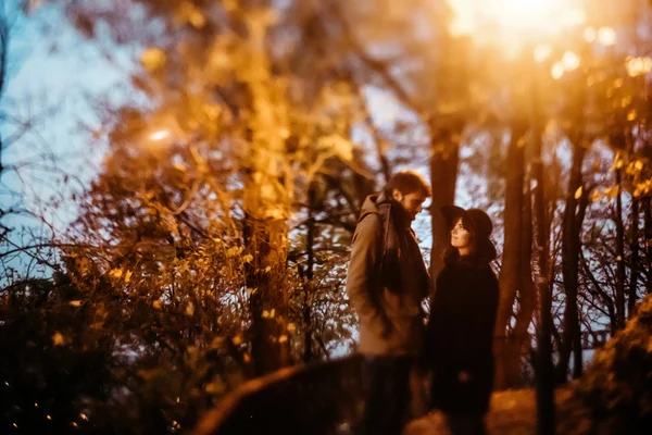 Happy stylish couple holding hands — Stock Photo, Image