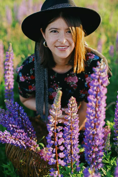 Beautiful Woman Relaxing Sunny Lupine Field Holding Rustic Basket Flowers — Stock Photo, Image