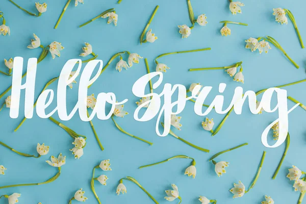 Hello Spring Hello Spring Text White Spring Flowers Blue Paper — Stock Photo, Image