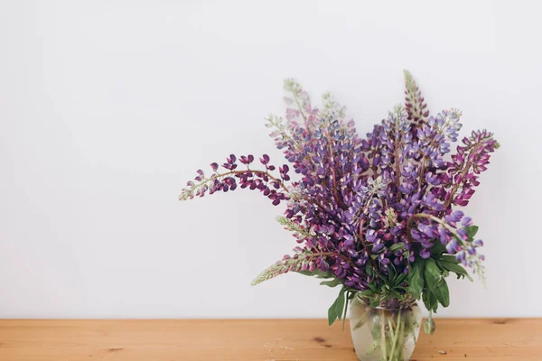 Beautiful Lupine Bouquet Wooden Table White Room Gathering Countryside Wildflowers — Stock Photo, Image