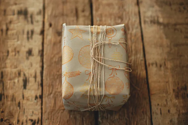 Stylish Christmas Gift Wrapped Grey Paper Thread Rustic Wooden Table — Φωτογραφία Αρχείου