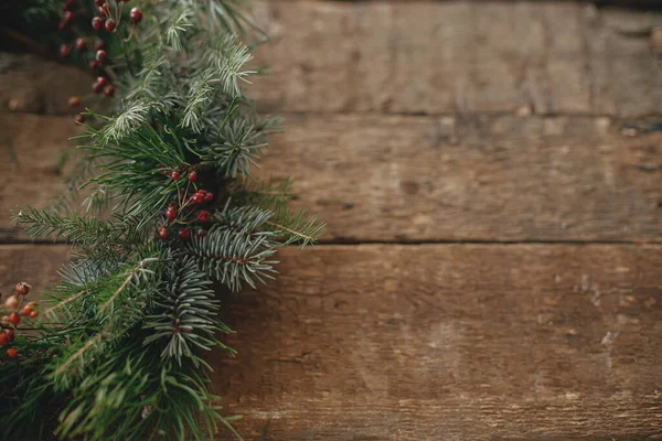 Stylish Christmas Wreath Spruce Fir Branches Red Berries Rustic Wooden — Stock Photo, Image