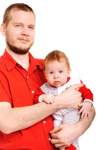 Padre sosteniendo a su hijo en las manos — Foto de Stock