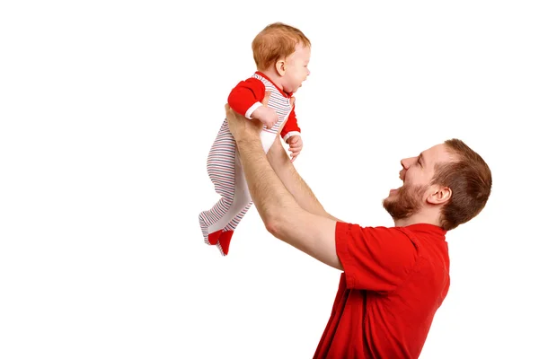 Padre sosteniendo a su hijo en las manos — Foto de Stock