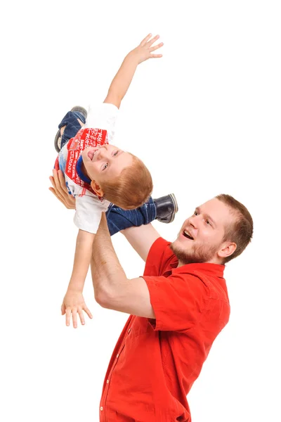 Padre sosteniendo a su hijo en las manos — Foto de Stock