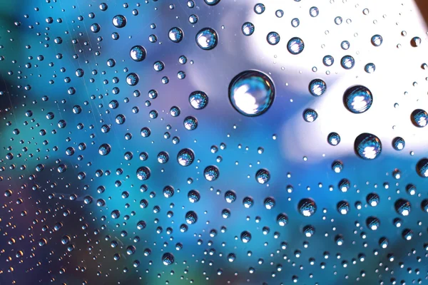 Water drops on plastic surface — Stock Photo, Image