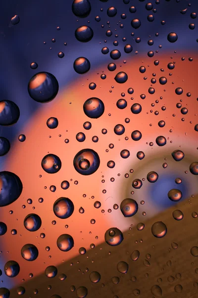 Water drops on plastic surface — Stock Photo, Image