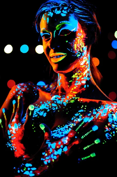 Girl posing in blacklight — Stock Photo, Image