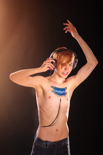 Young man posing in studio — Stock Photo, Image