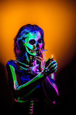 Skeleton bodyart with blacklight clipart