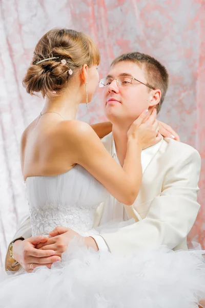 Bride and groom in wedding studio — Stock Photo, Image