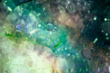 Arka plan, doku. Çok renkli daireler. Makro yağ kabarcıkları..