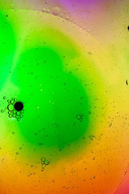 Arka plan, bokeh. Renkli bir arka planda hava kabarcıkları. Renkli arkaplan, yeşil, sarı ve pembe.