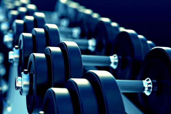 Row of metal dumbells — Stock Photo, Image