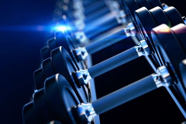 Row of metal dumbells — Stock Photo, Image