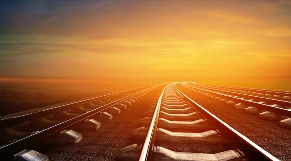 Empty railways on sunset sky background — Stock Photo, Image