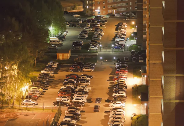 Top view of the Parking of cars near high-rise buildings.Night.Chelyabinsk.