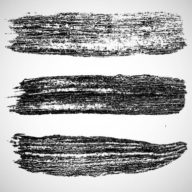 Bir dizi grunge fırça darbesi. Siyah boya lekeleri. Tasarımınız için element. 