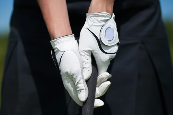 Demir veya golf sopası Golf oyuncu eldiven tutun