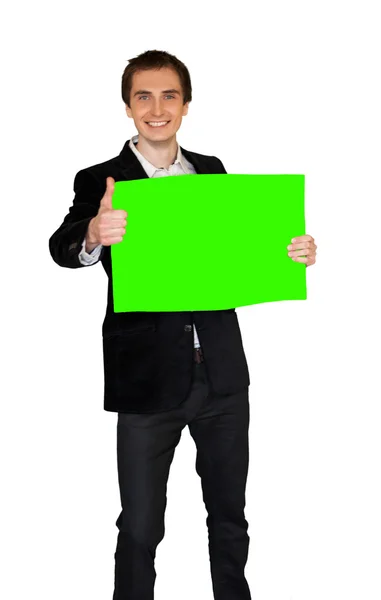 Attractive young man holding placard sign — Stock Photo, Image