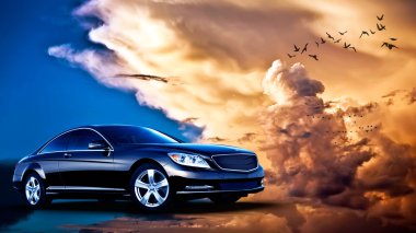 lüks bir araba arka tarafı görünümünü günbatımı üzerinde