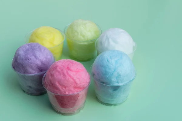 Colorful cotton candy in plastic cup — Stock Photo, Image