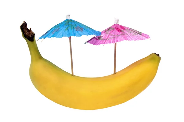 Банан с красочными зонтиками — стоковое фото