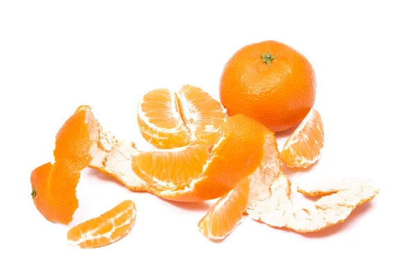 Tangerine fruit with peeled spiral skin — Stock Photo, Image