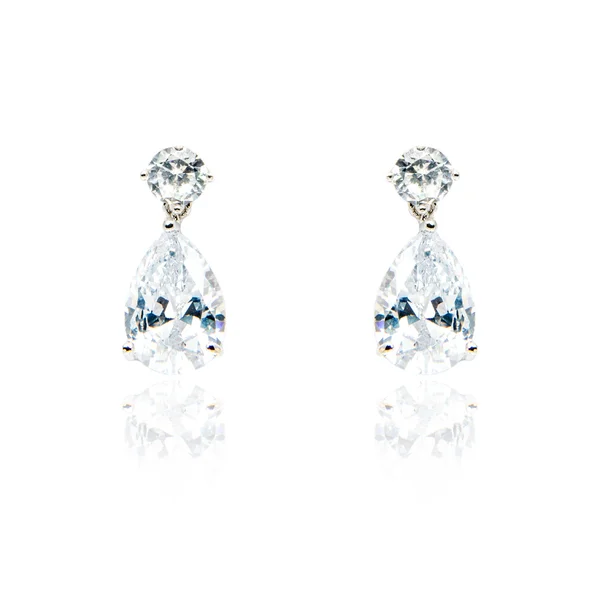 Pair of diamond earrings isolated on white — Stock Photo, Image