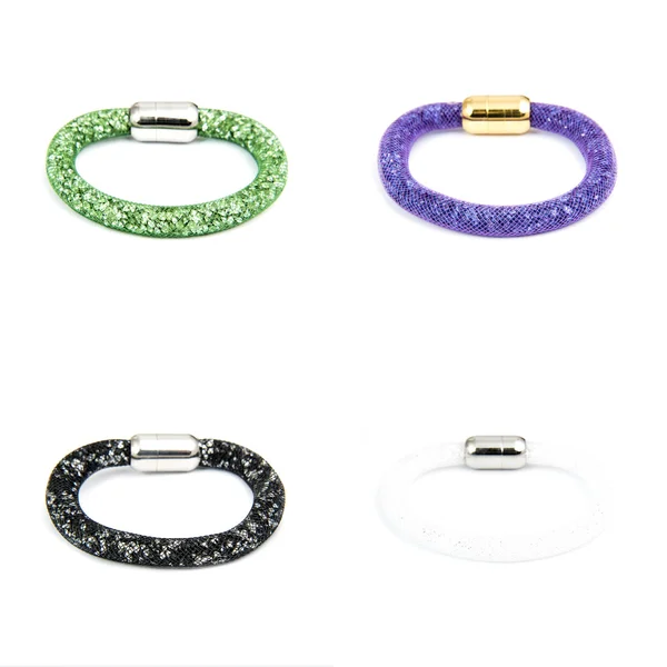 Set van vier verschillende kleur mode armbanden — Stockfoto