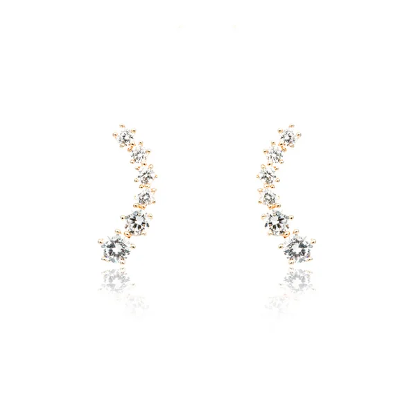 Pair of golden diamond earrings isolated on white — Stock Photo, Image