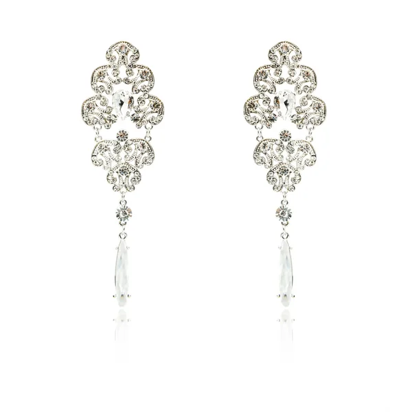 Pair of silver diamond earrings isolated on white — Stock Photo, Image