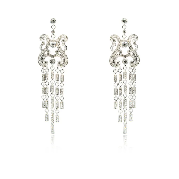 Pair of silver diamond earrings isolated on white — Stock Photo, Image