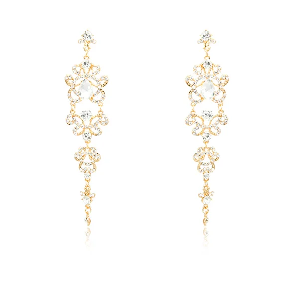 Pair of golden diamond earrings isolated on white — Stock Photo, Image